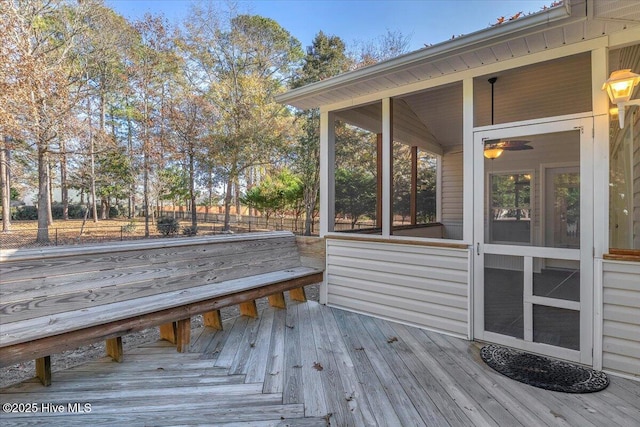 wooden terrace with a sunroom