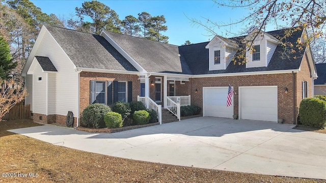 cape cod-style house with a garage