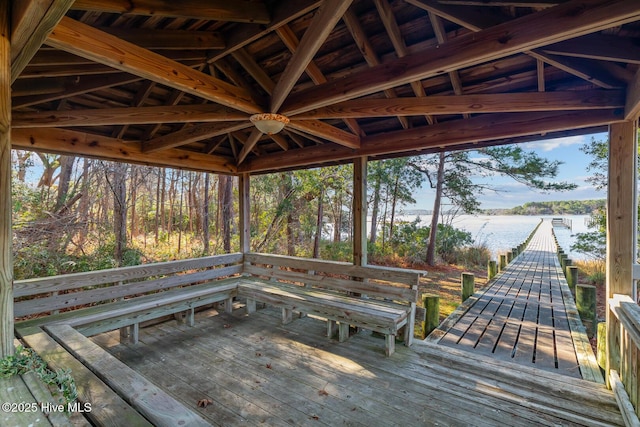 deck featuring a gazebo and a water view