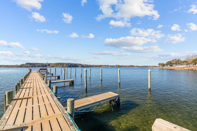 view of dock with a water view