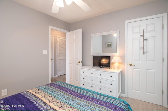 laundry area with stacked washer and dryer