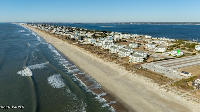 bird's eye view with a view of the beach and a water view