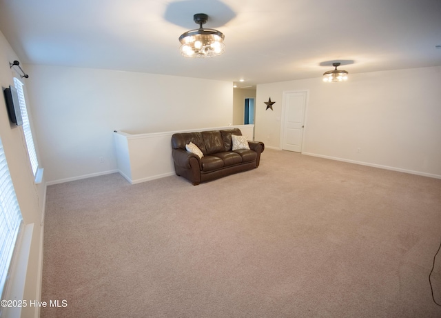 living room featuring light carpet