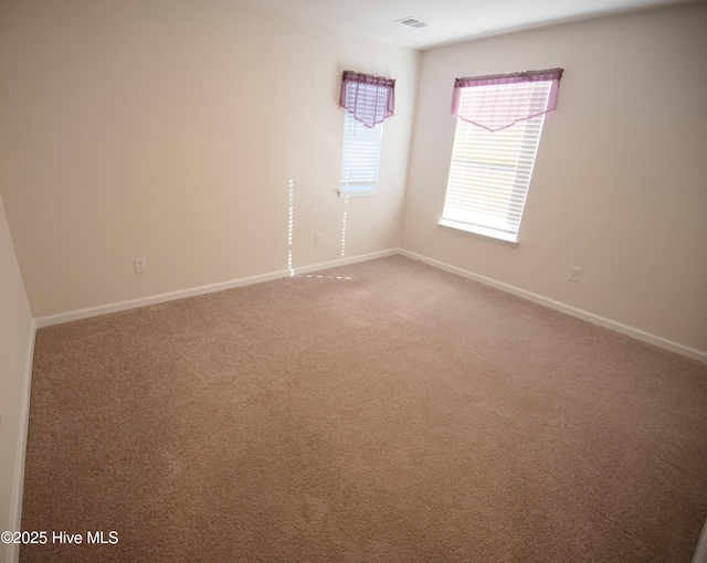 view of carpeted spare room