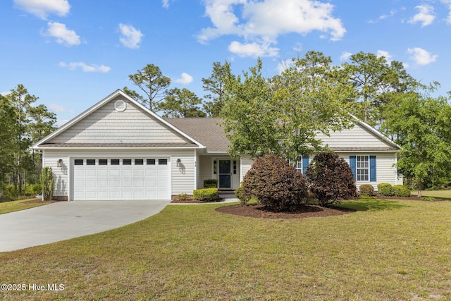 view of front facade with a front yard and a garage