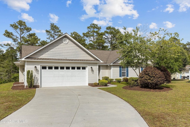 view of front facade with a front yard and a garage