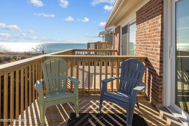 balcony with a deck with water view