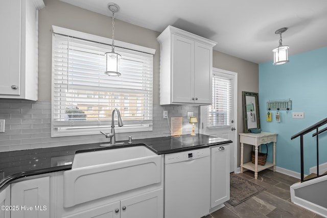 kitchen featuring dishwasher, a healthy amount of sunlight, pendant lighting, white cabinets, and sink