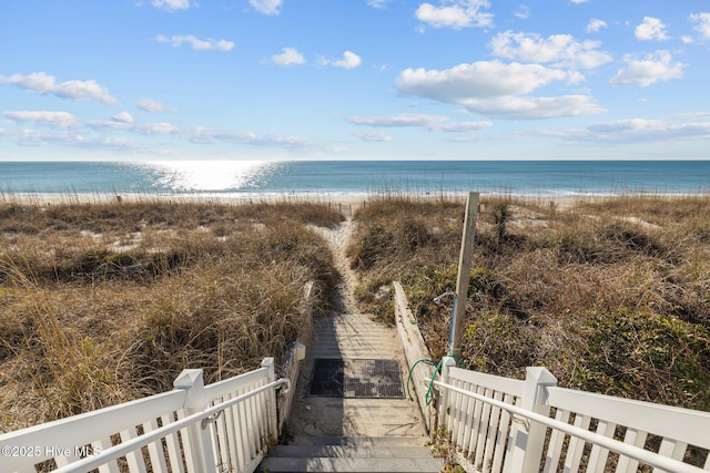 view of water feature with a beach view