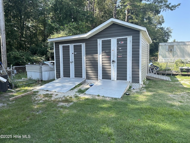 view of outdoor structure with a yard