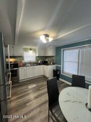 dining area featuring wood-type flooring