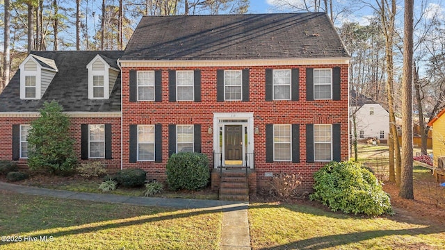 view of front of home featuring a front yard