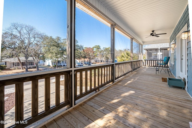 deck with a porch and ceiling fan