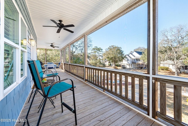 wooden deck with ceiling fan