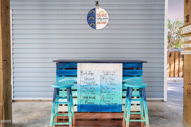 exterior space featuring an outdoor bar