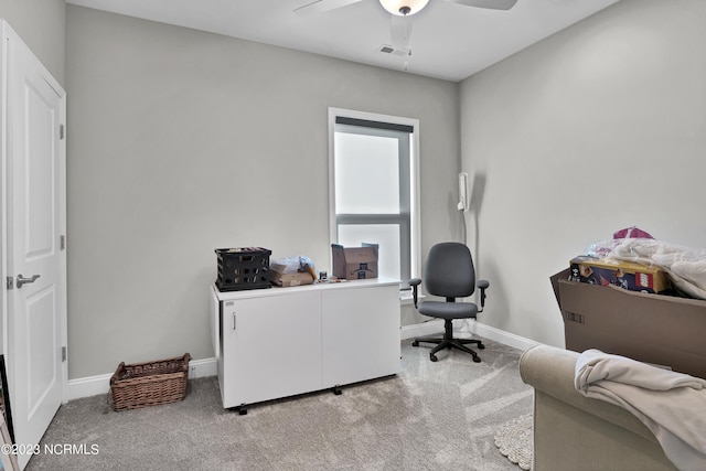 home office with light colored carpet and ceiling fan