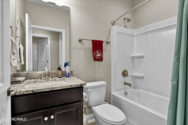 full bathroom with shower / tub combo, vanity, and toilet