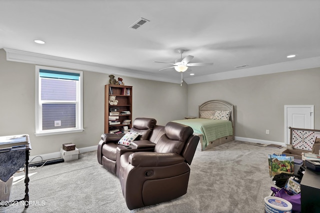 bedroom featuring light carpet, ceiling fan, and ornamental molding