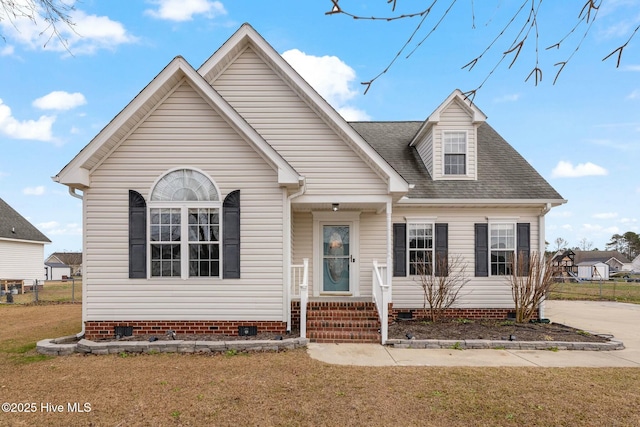 view of front of home with a front yard