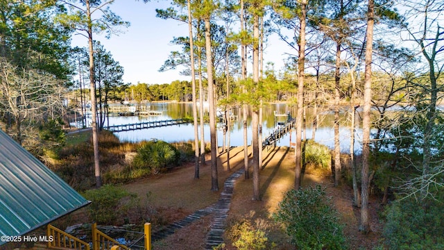 view of water feature with a dock