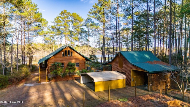 exterior space featuring an outbuilding