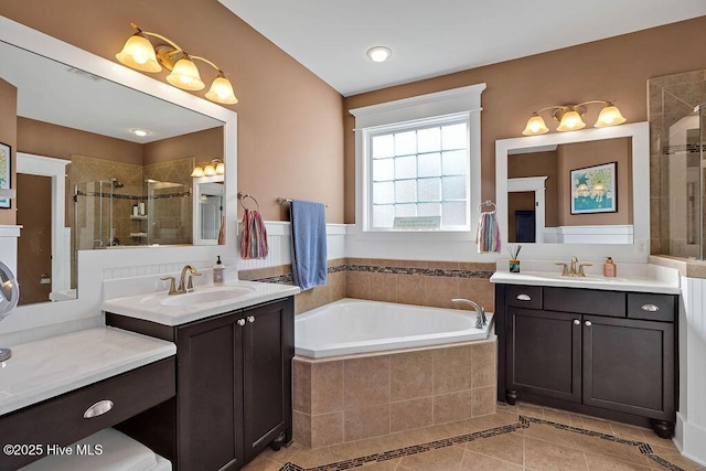 bathroom with vanity, tile patterned flooring, and independent shower and bath