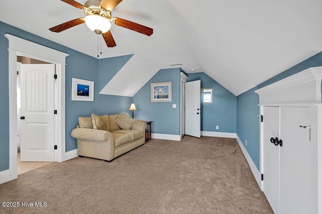 living area with lofted ceiling, light carpet, and ceiling fan