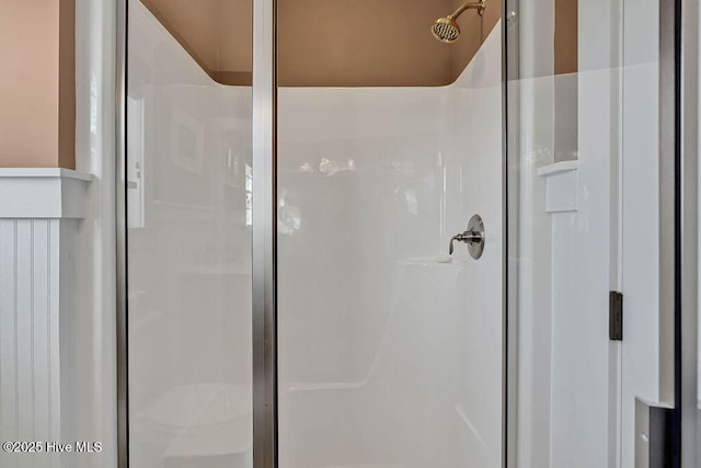 bathroom featuring an enclosed shower