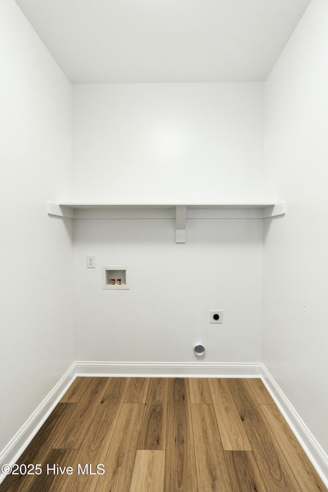 washroom featuring hookup for an electric dryer, washer hookup, and wood-type flooring