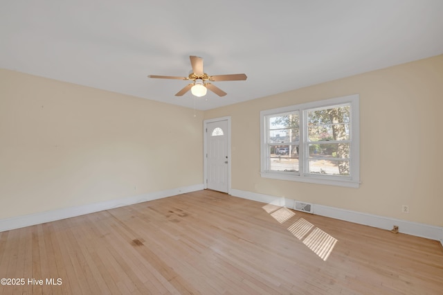 interior space with ceiling fan and light hardwood / wood-style floors