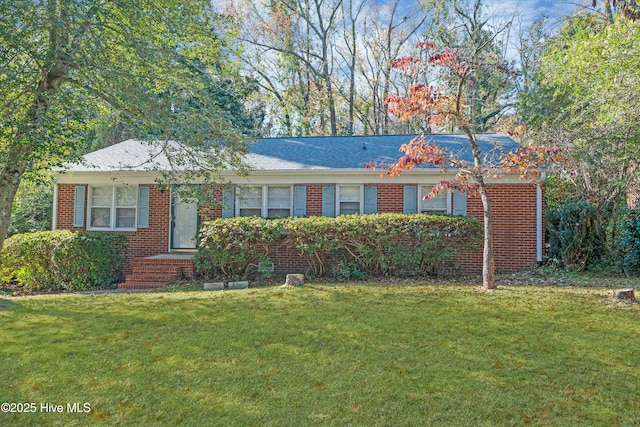 ranch-style home with a front yard