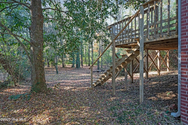 view of yard featuring a wooden deck