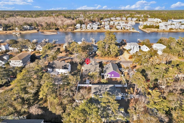 aerial view with a residential view and a water view