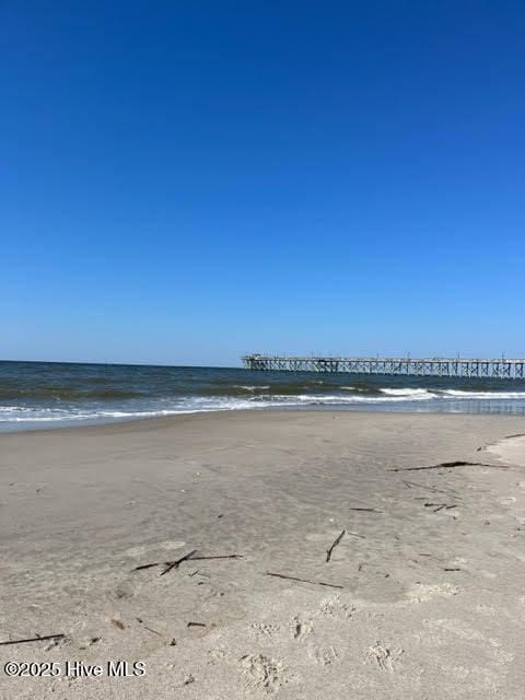 view of water feature with a beach view