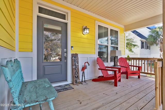 doorway to property with a porch