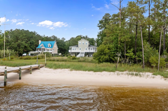 view of community with a water view