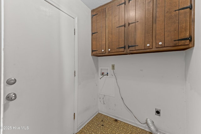 laundry room with cabinets, hookup for a washing machine, and hookup for an electric dryer