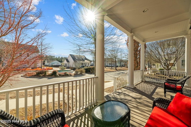 balcony featuring a porch