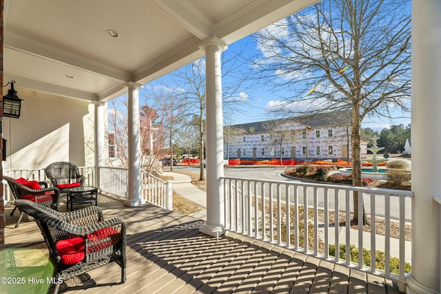 balcony featuring covered porch