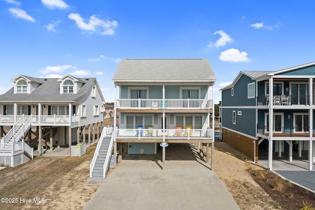 rear view of house with a carport