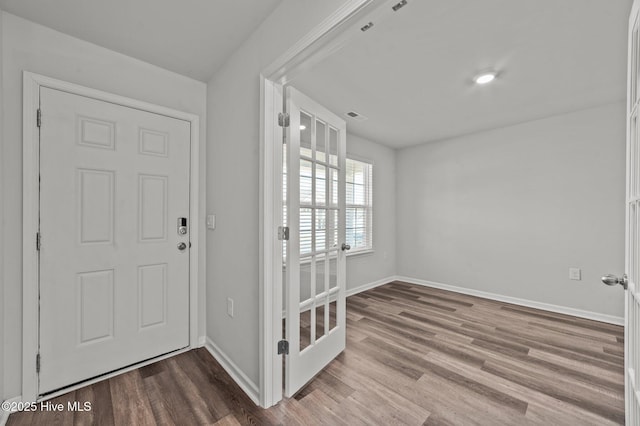 entrance foyer featuring hardwood / wood-style floors