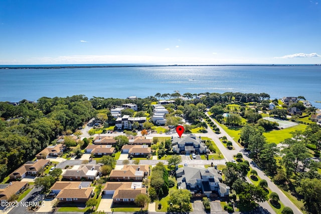 drone / aerial view with a water view