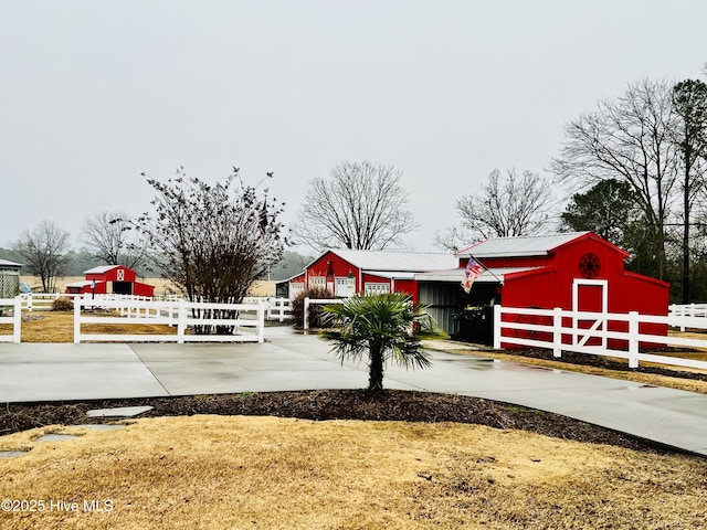 exterior space featuring an outbuilding and a yard