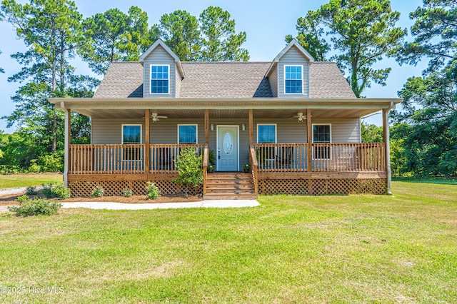 view of front of property with a porch and a front yard