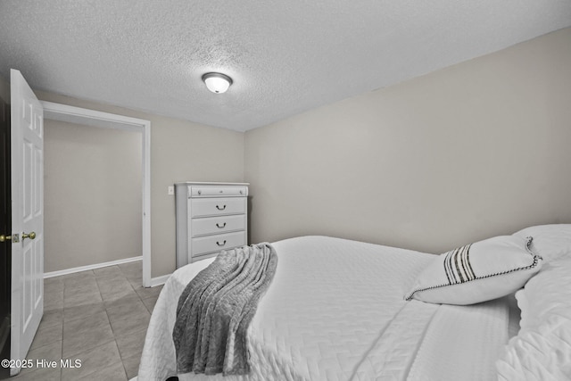 bedroom with a textured ceiling