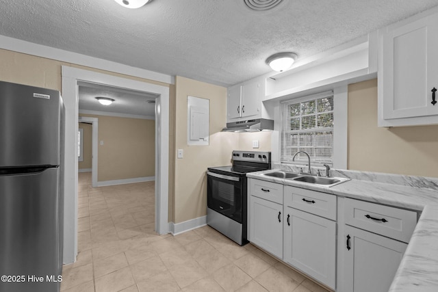 kitchen featuring stainless steel appliances, white cabinetry, and sink