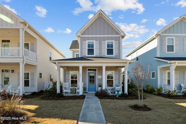 view of front facade with a porch and a front yard