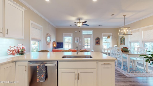 kitchen with dishwasher, white cabinetry, sink, and ceiling fan with notable chandelier