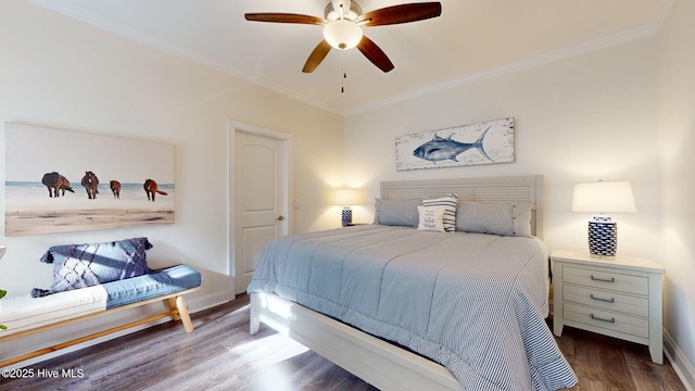 bedroom with ceiling fan, crown molding, and hardwood / wood-style flooring