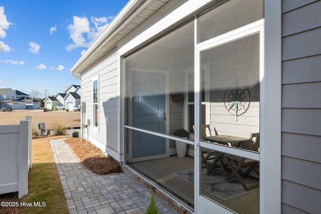 exterior space with a sunroom